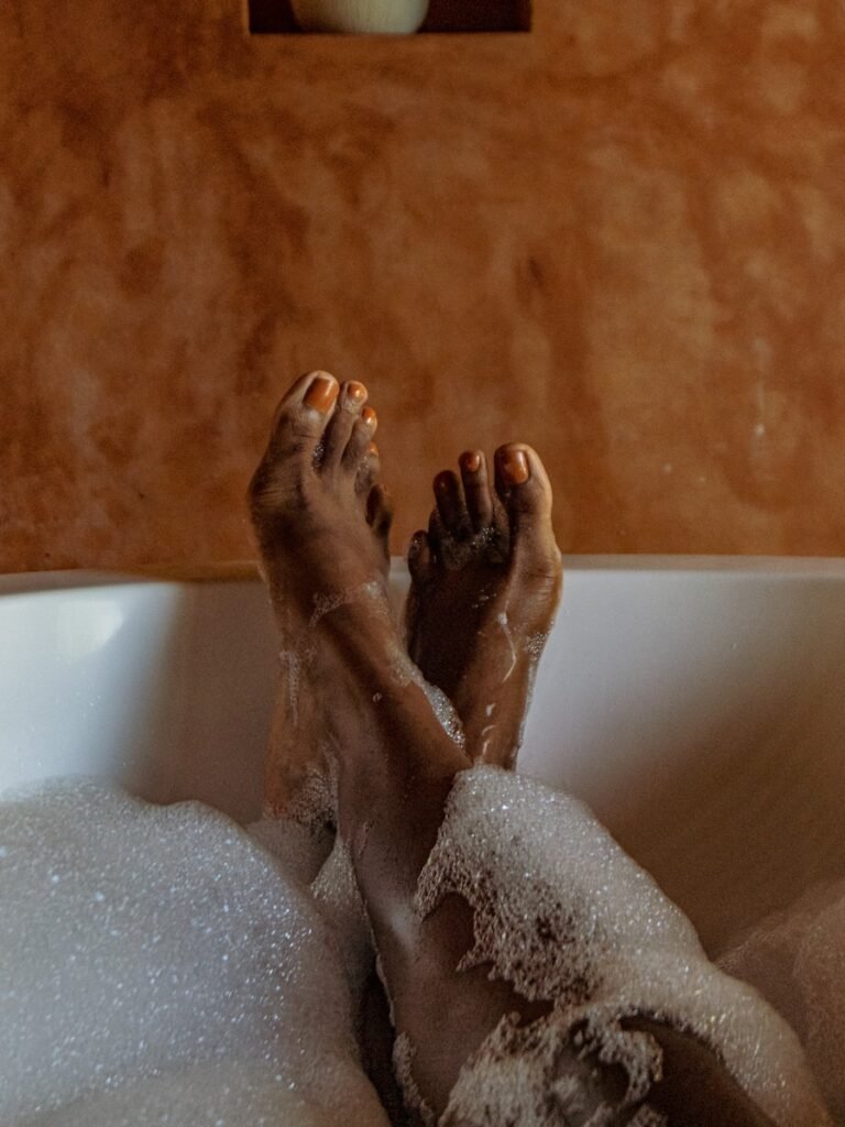 person in bathtub with water