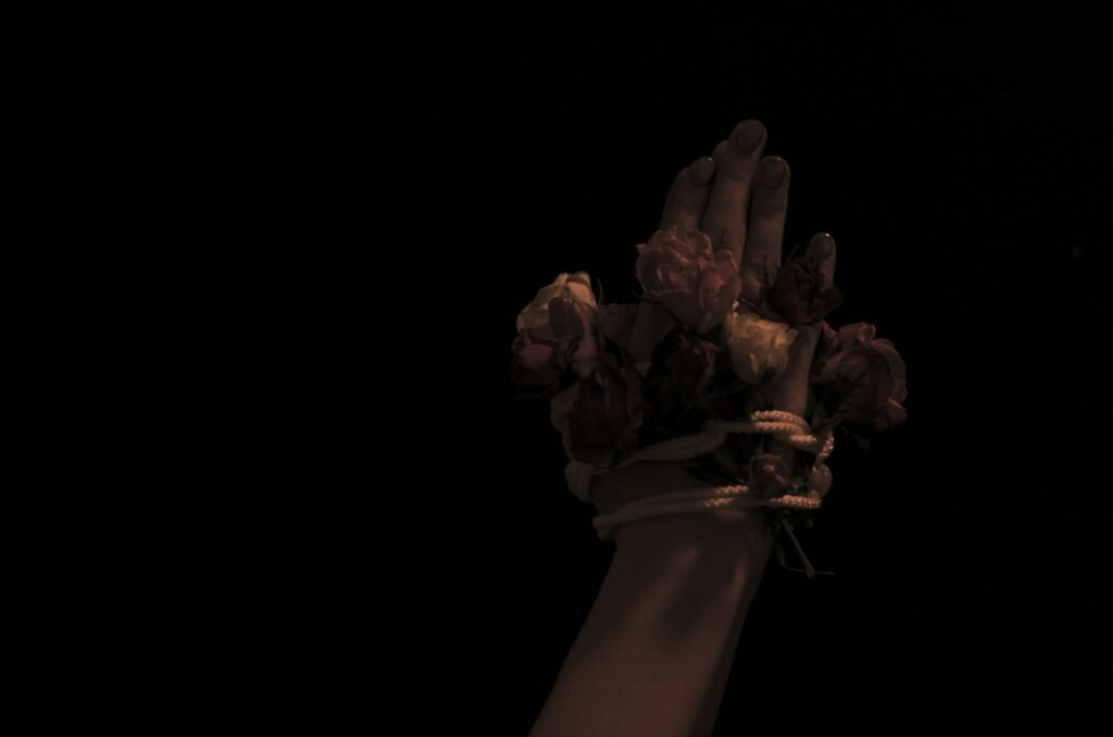 person holding brown flower bouquet