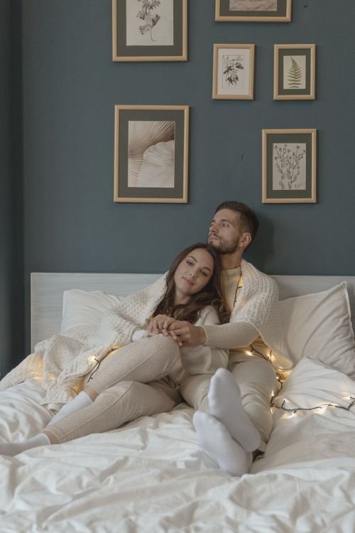 Loving couple sharing a tender moment together in bed