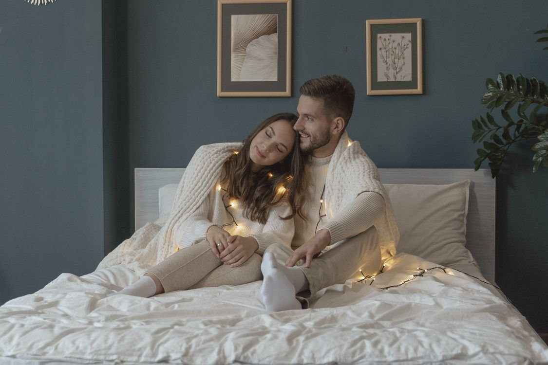 Couple relaxing together with soft lighting